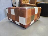 Patchwork Savanna Leather Ottoman handcrafted in full-grain leather with stitched patchwork design by Maree Meubels.